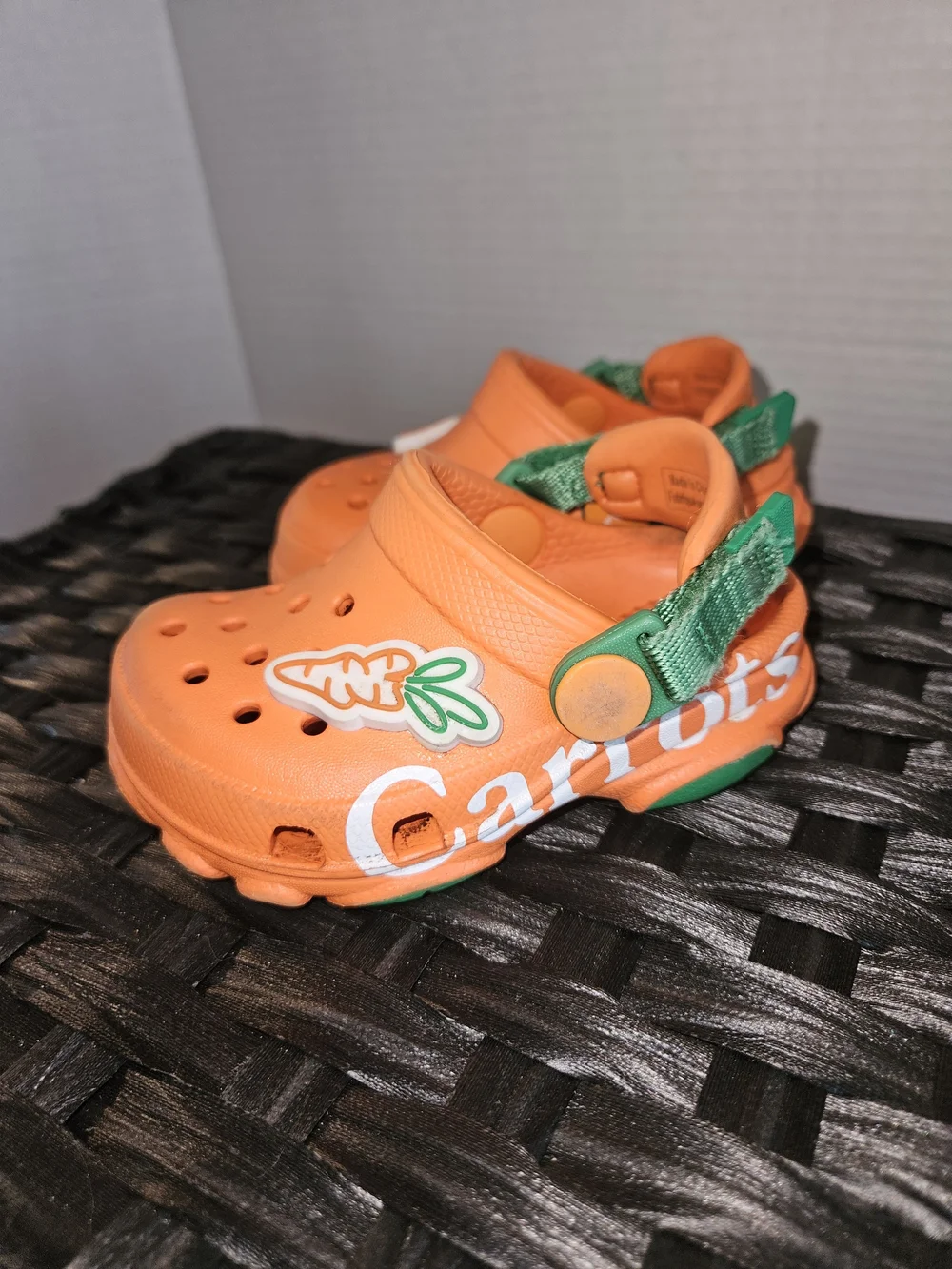 CROCS Kids Orange Clogs with Green Strap and Carrot Charm